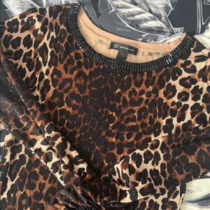 Leopard tunic sweater with gem accents!